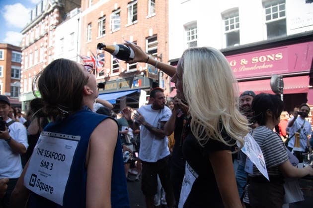 SOHO Waiters Race at SOHO, London, UK - Sun 19 July 2026 Waiters from various London restaurants take part in the annual SOHO Waiters Race, balancing a champagne bottle and a glass around SOHO in London, England, UK on Sunday 19 July 2026 as part of the SOHO Village Fete., Credit:Justin Ng Avalon UK, England, London, SOHO  Copyright: xJustinxNgx xAvalonx 1117372245