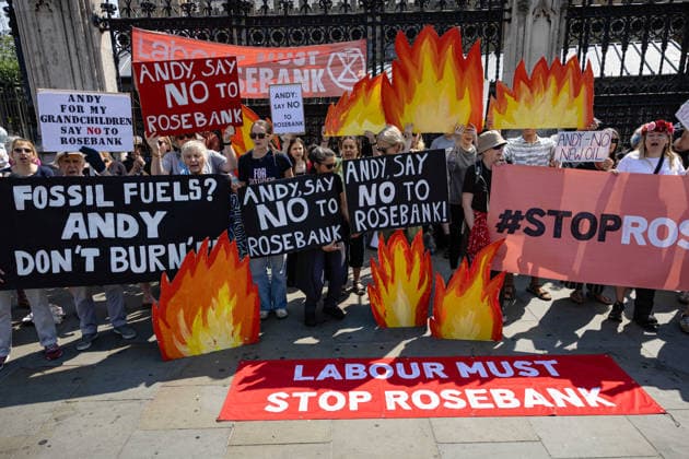 Fossil Free London Protest against Rosebank Oil Field outside Parliament, London, UK 18 July 2026 Campaigners from Fossil Free London demonstrate outside Parliament, London, UK, on 18 July 2026, with placards and banners calling on incoming Prime Minister Andy Burnham not to approve the Rosebank oil field or new North Sea drilling. The protest follows the UK s third heatwave in as many months, during which official statistics recorded over 2,700 heat-related deaths across England and Wales., Credit:Pete Speller Avalon  Copyright: xPetexSpellerx xAvalonx 1117383320