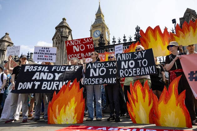 Fossil Free London Protest against Rosebank Oil Field outside Parliament, London, UK 18 July 2026 Campaigners from Fossil Free London demonstrate outside Parliament, London, UK, on 18 July 2026, with placards and banners calling on incoming Prime Minister Andy Burnham not to approve the Rosebank oil field or new North Sea drilling. The protest follows the UK s third heatwave in as many months, during which official statistics recorded over 2,700 heat-related deaths across England and Wales., Credit:Pete Speller Avalon  Copyright: xPetexSpellerx xAvalonx 1117383351