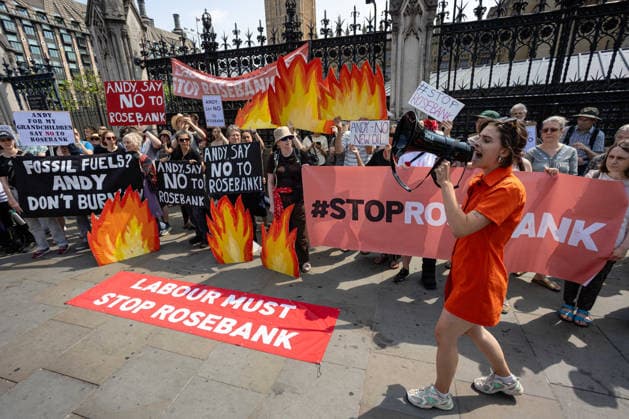 Fossil Free London Protest against Rosebank Oil Field outside Parliament, London, UK 18 July 2026 Campaigners from Fossil Free London demonstrate outside Parliament, London, UK, on 18 July 2026, with placards and banners calling on incoming Prime Minister Andy Burnham not to approve the Rosebank oil field or new North Sea drilling. The protest follows the UK s third heatwave in as many months, during which official statistics recorded over 2,700 heat-related deaths across England and Wales., Credit:Pete Speller Avalon  Copyright: xPetexSpellerx xAvalonx 1117383424