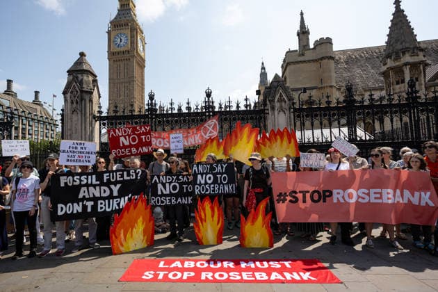Fossil Free London Protest against Rosebank Oil Field outside Parliament, London, UK 18 July 2026 Campaigners from Fossil Free London demonstrate outside Parliament, London, UK, on 18 July 2026, with placards and banners calling on incoming Prime Minister Andy Burnham not to approve the Rosebank oil field or new North Sea drilling. The protest follows the UK s third heatwave in as many months, during which official statistics recorded over 2,700 heat-related deaths across England and Wales., Credit:Pete Speller Avalon  Copyright: xPetexSpellerx xAvalonx 1117383435
