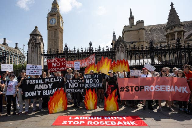 Fossil Free London Protest against Rosebank Oil Field outside Parliament, London, UK 18 July 2026 Campaigners from Fossil Free London demonstrate outside Parliament, London, UK, on 18 July 2026, with placards and banners calling on incoming Prime Minister Andy Burnham not to approve the Rosebank oil field or new North Sea drilling. The protest follows the UK s third heatwave in as many months, during which official statistics recorded over 2,700 heat-related deaths across England and Wales., Credit:Pete Speller Avalon  Copyright: xPetexSpellerx xAvalonx 1117383448