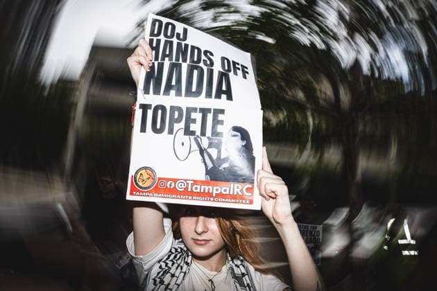 July 19, 2026, Tampa, Florida, USA: A sign in support of immigrant rights activist NADIA TOPETE while following the recent killings of two people, LORENZO SALGADO ARAUJO in Houston, Texas and JOHAN SEBASTIAN DURAN GUERRERO in Biddeford, Maine members of the Tampa Immigrant Rights Committee staged an emergency protest to show solidarity with all those affected. Tampa USA  - ZUMAd256 20260719_znp_d256_003 Copyright: xDavexDeckerx