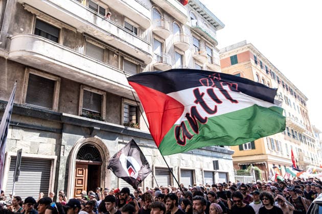 July 19, 2026, Genoa, Liguria, Italy: Twenty-five years after the 2001 G8 summit in Genoa, thousands of people took part in the Ã¢â‚¬oeIn any case, no regretsÃ¢â‚¬Â demonstration to commemorate Carlo Giuliani, a young man who died during the protests against the summit. His death, along with the police violence at the Diaz School and the Bolzaneto barracks, made the G8 summit one of the most discussed events in recent Italian history. Genoa Italy  - ZUMAs377 20260719_znp_s377_003 Copyright: xPietroxStariccox