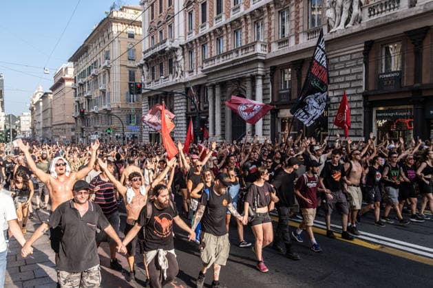 July 19, 2026, Genoa, Liguria, Italy: Twenty-five years after the 2001 G8 summit in Genoa, thousands of people took part in the Ã¢â‚¬oeIn any case, no regretsÃ¢â‚¬Â demonstration to commemorate Carlo Giuliani, a young man who died during the protests against the summit. His death, along with the police violence at the Diaz School and the Bolzaneto barracks, made the G8 summit one of the most discussed events in recent Italian history. Genoa Italy  - ZUMAs377 20260719_znp_s377_027 Copyright: xPietroxStariccox