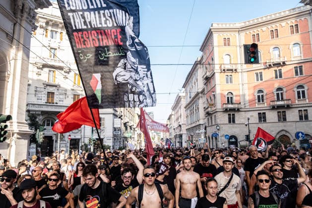 July 19, 2026, Genoa, Liguria, Italy: Twenty-five years after the 2001 G8 summit in Genoa, thousands of people took part in the Ã¢â‚¬oeIn any case, no regretsÃ¢â‚¬Â demonstration to commemorate Carlo Giuliani, a young man who died during the protests against the summit. His death, along with the police violence at the Diaz School and the Bolzaneto barracks, made the G8 summit one of the most discussed events in recent Italian history. Genoa Italy  - ZUMAs377 20260719_znp_s377_029 Copyright: xPietroxStariccox