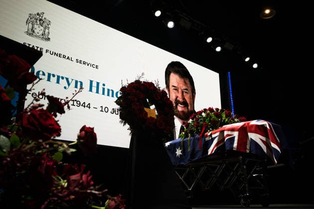 DERRYN HINCH STATE FUNERAL, The stage and coffin of Derryn Hinch during a State Funeral Service for Derryn Hinch at the Timber Yard, Melbourne, Monday, July 20, 2026. . Outspoken media figure and former senator Derryn Hinch has died at the age of 82 after a long and public health battle. ( NO ARCHIVING MELBOURNE VICTORIA AUSTRALIA  Copyright: xCHRISTOPHERxHOPKINSx 20260720172528892966