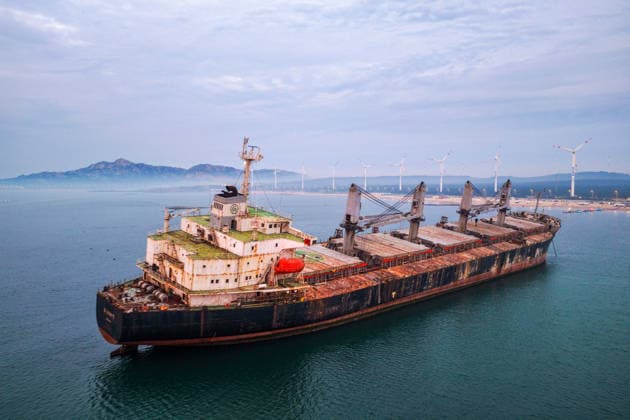WEIHAI, CHINA - JULY 19: A view of the stranded Blueways ship against the sunset glow on July 19, 2026 in Weihai, Shandong Province of China. The vessel was stranded off the coast of Weihai and has become a popular spot for visitors.  Copyright: xVCGx 111655336159