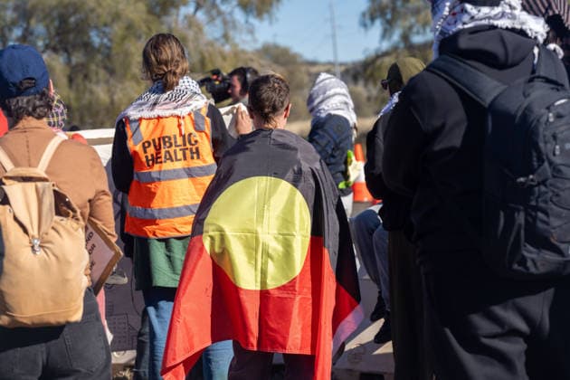 CLOSE PINE GAP PROTEST ALICE SPRINGS, Hundreds of protesters convoy during the three-day Close Pine Gap symposium in Alice Springs, Northern Territory, Monday, July 20, 2026. Those gathered are calling for the closure of the US military intelligence base Pine Gap, for an end to the US alliance, and for the sacred land the base occupies to be returned to Arrernte custodians, who never consented to the base. ( NO ARCHIVING ALICE SPRINGS NORTHERN TERRITORY AUSTRALIA  Copyright: xRHETTxHAMMERTONx 20260720178176182230
