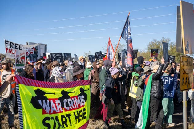 CLOSE PINE GAP PROTEST ALICE SPRINGS, Hundreds of protesters convoy during the three-day Close Pine Gap symposium in Alice Springs, Northern Territory, Monday, July 20, 2026. Those gathered are calling for the closure of the US military intelligence base Pine Gap, for an end to the US alliance, and for the sacred land the base occupies to be returned to Arrernte custodians, who never consented to the base. ( NO ARCHIVING ALICE SPRINGS NORTHERN TERRITORY AUSTRALIA  Copyright: xRHETTxHAMMERTONx 20260720180107023317