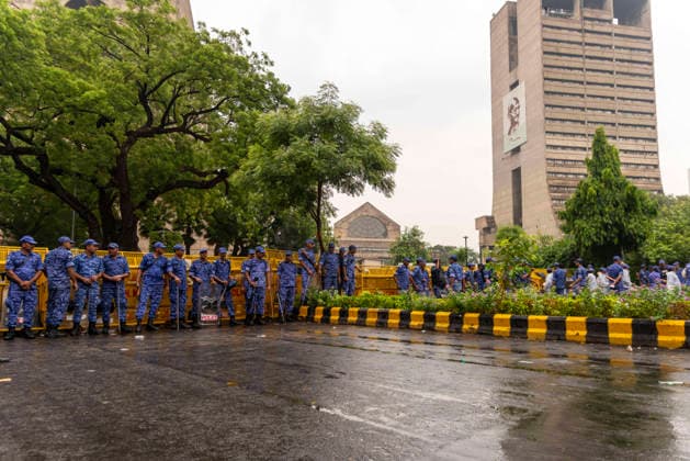 July 20, 2026, New Delhi, Delhi, India: Supporters of India s Cockroach Janta Party (CJP) gather before a march to Parliament during a protest demanding the resignation of Education Minister Dharmendra Pradhan over alleged exam paper leaks. Members of the Rapid Action Force (RAF) are deployed at the protest site near Jantar Mantar in New Delhi, India. New Delhi India  - ZUMAt180 20260720_zip_t180_001 Copyright: xJaixThakurx