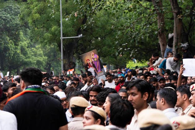 July 20, 2026, New Delhi, Delhi, India: Supporters of India s Cockroach Janta Party (CJP) gather before a march to Parliament during a protest demanding the resignation of Education Minister Dharmendra Pradhan over alleged exam paper leaks. Members of the Rapid Action Force (RAF) are deployed at the protest site near Jantar Mantar in New Delhi, India. New Delhi India  - ZUMAt180 20260720_zip_t180_005 Copyright: xJaixThakurx