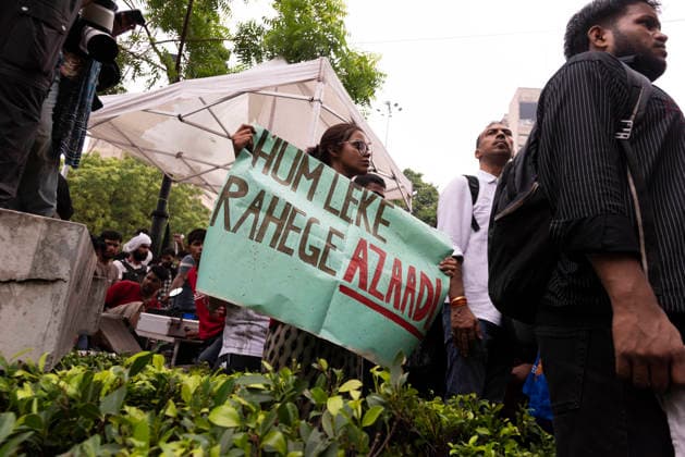 July 20, 2026, New Delhi, Delhi, India: Supporters of India s Cockroach Janta Party (CJP) gather before a march to Parliament during a protest demanding the resignation of Education Minister Dharmendra Pradhan over alleged exam paper leaks. Members of the Rapid Action Force (RAF) are deployed at the protest site near Jantar Mantar in New Delhi, India. New Delhi India  - ZUMAt180 20260720_zip_t180_011 Copyright: xJaixThakurx