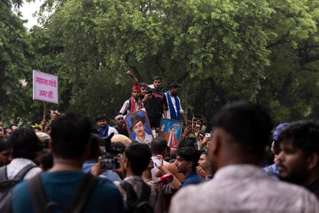 July 20, 2026, New Delhi, Delhi, India: Supporters of India s Cockroach Janta Party (CJP) gather before a march to Parliament during a protest demanding the resignation of Education Minister Dharmendra Pradhan over alleged exam paper leaks. Members of the Rapid Action Force (RAF) are deployed at the protest site near Jantar Mantar in New Delhi, India. New Delhi India - ZUMAt180 20260720_zip_t180_003 Copyright: xJaixThakurx