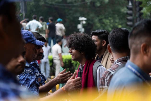 July 20, 2026, New Delhi, Delhi, India: Supporters of India s Cockroach Janta Party (CJP) gather before a march to Parliament during a protest demanding the resignation of Education Minister Dharmendra Pradhan over alleged exam paper leaks. Members of the Rapid Action Force (RAF) are deployed at the protest site near Jantar Mantar in New Delhi, India. New Delhi India - ZUMAt180 20260720_zip_t180_015 Copyright: xJaixThakurx