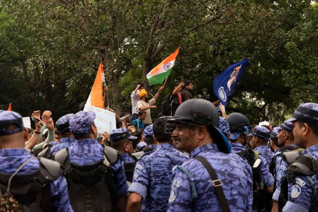 July 20, 2026, New Delhi, Delhi, India: Supporters of India s Cockroach Janta Party (CJP) gather before a march to Parliament during a protest demanding the resignation of Education Minister Dharmendra Pradhan over alleged exam paper leaks. Members of the Rapid Action Force (RAF) are deployed at the protest site near Jantar Mantar in New Delhi, India. New Delhi India - ZUMAt180 20260720_zip_t180_017 Copyright: xJaixThakurx