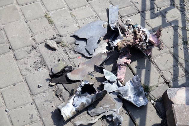 Russian missile debris lies on the pavement near an underpass outside the Lukianivska metro station in the Shevchenkivskyi district after a large-scale overnight Russian missile attack, Kyiv, Ukraine, July 19, 2026. The Russian army launched a massive attack on the capital with ballistic missiles. According to the State Emergency Service of Ukraine, an 89-year-old woman was killed and 15 people were injured. Falling debris and fires were reported in five districts of the city, while a direct hit was recorded at the underpass near Lukianivska metro station. (Photo by Pavlo Bahmut Ukrinform) Russian missile hits underground passage near Lukianivska metro station in Kyiv  Copyright: xPavloxBahmutx
