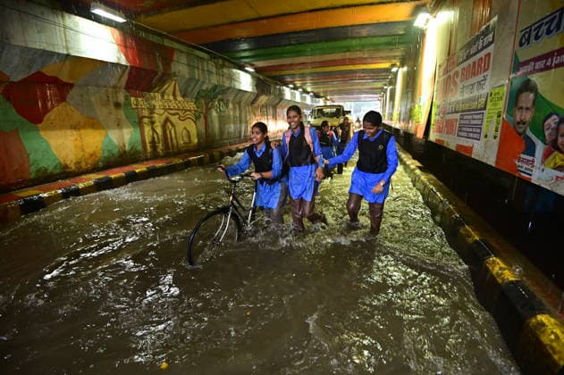 July 20, 2026, Prayagraj, Uttar Pradesh, India: Prayagraj: Vehicle ply trough a waterlogged railway under pass after heavy rain, in Prayagraj on Monday, July 20, 2026. Prayagraj India - ZUMAv115 20260720_zap_v115_014 Copyright: xPrabhatxKumarxVermax