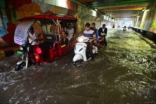 July 20, 2026, Prayagraj, Uttar Pradesh, India: Prayagraj: Vehicle ply trough a waterlogged railway under pass after heavy rain, in Prayagraj on Monday, July 20, 2026. Prayagraj India - ZUMAv115 20260720_zap_v115_019 Copyright: xPrabhatxKumarxVermax