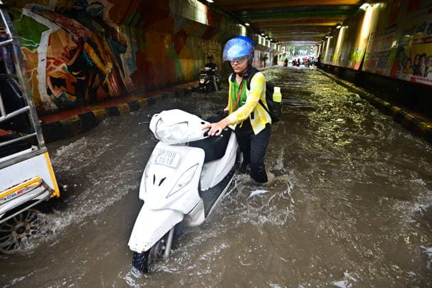 July 20, 2026, Prayagraj, Uttar Pradesh, India: Prayagraj: Vehicle ply trough a waterlogged railway under pass after heavy rain, in Prayagraj on Monday, July 20, 2026. Prayagraj India - ZUMAv115 20260720_zap_v115_022 Copyright: xPrabhatxKumarxVermax