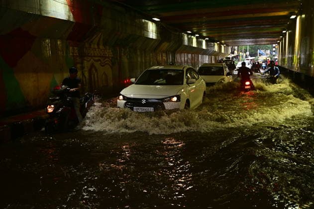 July 20, 2026, Prayagraj, Uttar Pradesh, India: Prayagraj: Vehicle ply trough a waterlogged railway under pass after heavy rain, in Prayagraj on Monday, July 20, 2026. Prayagraj India - ZUMAv115 20260720_zap_v115_023 Copyright: xPrabhatxKumarxVermax