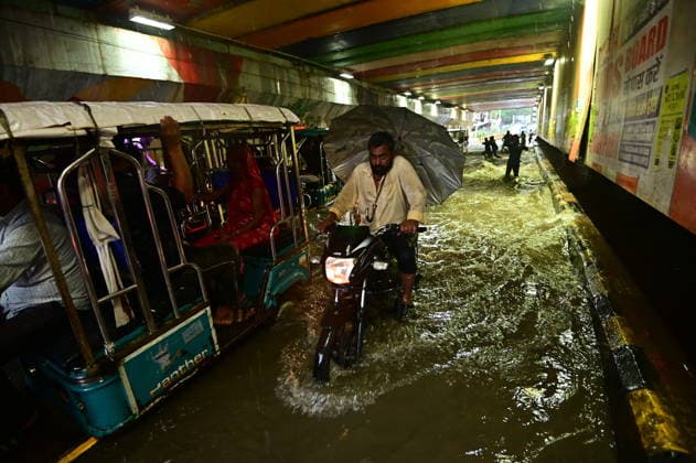 July 20, 2026, Prayagraj, Uttar Pradesh, India: Prayagraj: Vehicle ply trough a waterlogged railway under pass after heavy rain, in Prayagraj on Monday, July 20, 2026. Prayagraj India - ZUMAv115 20260720_zap_v115_024 Copyright: xPrabhatxKumarxVermax
