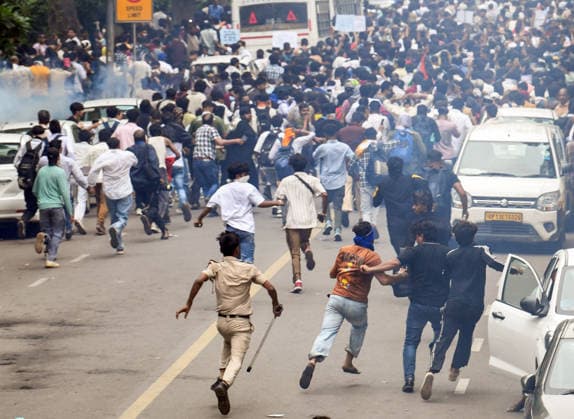 Security personnel fire tear gas shells at protesters near Jantar Mantar New Delhi, Jul 20 (ANI): Security personnel carry out Lathi charge to disperse the protesters during the protest by Cockroach Janta Party near Jantar Mantar, in New Delhi on Monday. New Delhi Delhi India Copyright: xANIx ANI_20260720538