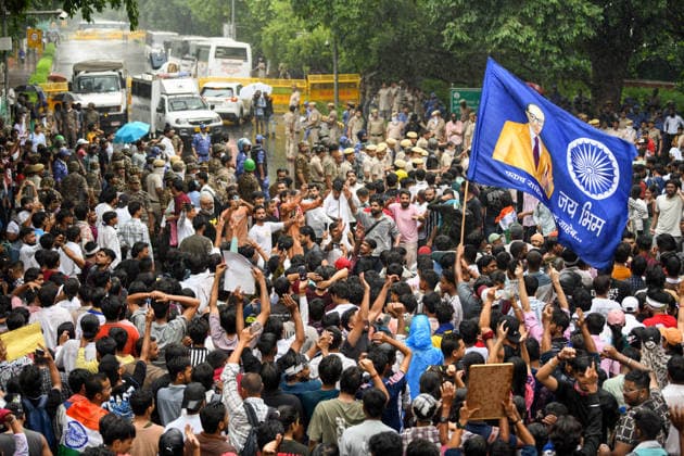 Protesters gather in masses to participate in CJP protest New Delhi, Jul 20 (ANI): Police personnel and protesters scuffle during the protest by Cockroach Janta Party near Jantar Mantar, in New Delhi on Monday. New Delhi Delhi India Copyright: xANIx ANI_20260720543