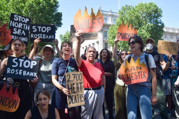 July 20, 2026, London, England, United Kingdom: Climate activists from the group Fossil Free London stage a protest outside Downing Street against Rosebank and other oil and gas projects in the North Sea ahead of the arrival of Andy Burnham, who replaces Keir Starmer as the UK Prime Minister. London United Kingdom  - ZUMAv130 20260720_zip_v130_009 Copyright: xVukxValcicx