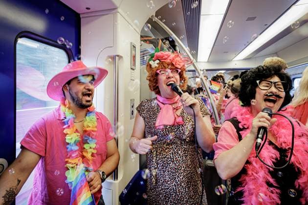 UTRECHT - Participants travel to Tilburg station on the Pink Monday Express. On Pink Monday, diversity, equality, and inclusion are traditionally celebrated at the Tilburg fair. RAMON VAN FLYMEN ANP netherlands out - belgium out  Copyright: xx x563925425x originalFilename: 563925425.jpg