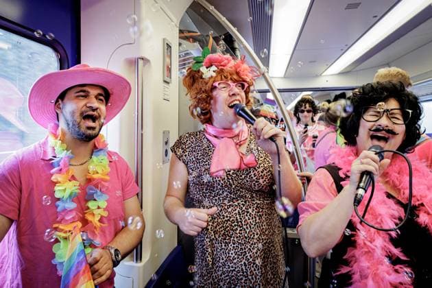 UTRECHT - Participants travel to Tilburg station on the Pink Monday Express. On Pink Monday, diversity, equality, and inclusion are traditionally celebrated at the Tilburg fair. RAMON VAN FLYMEN ANP netherlands out - belgium out  Copyright: xx x563925552x originalFilename: 563925552.jpg