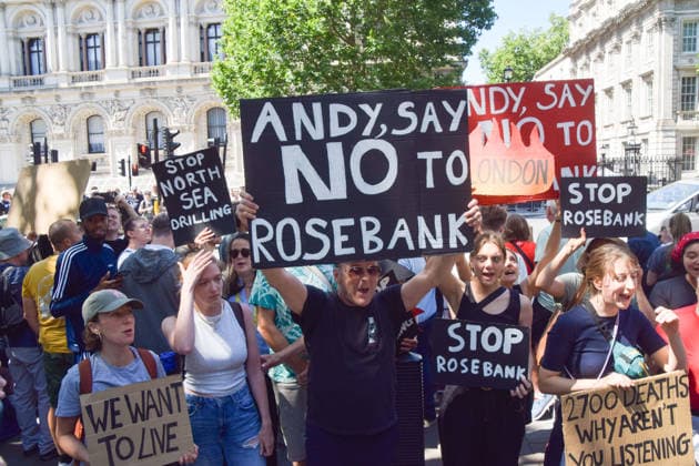 July 20, 2026, London, England, United Kingdom: Climate activists from the group Fossil Free London stage a protest outside Downing Street against Rosebank and other oil and gas projects in the North Sea ahead of the arrival of Andy Burnham, who replaces Keir Starmer as the UK Prime Minister. London United Kingdom - ZUMAv130 20260720_zip_v130_027 Copyright: xVukxValcicx