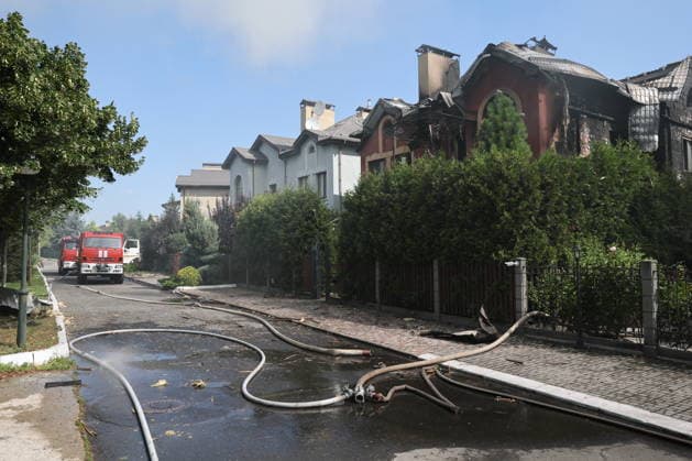 RUSSIA, DONETSK - JULY 20, 2026: Fire crews battle fires at residential buildings after a Ukrainian military strike on Kuibyshevsky neighbourhood. Dmitry Yagodkin TASS  95262636