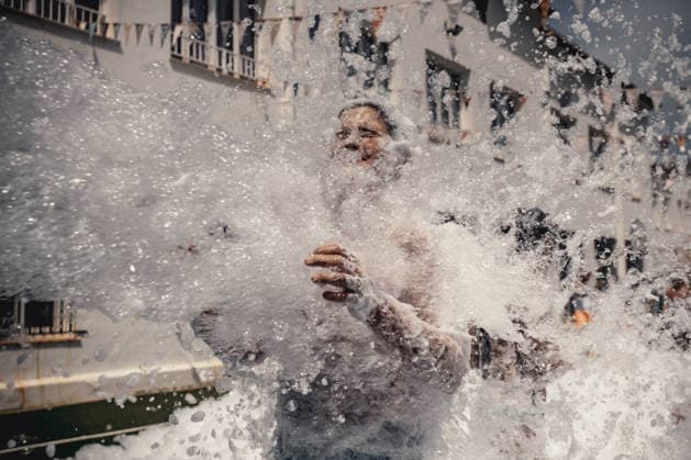 July 20, 2026, Es Mercadal, Menorca Balearic Islands, Spain: Children get covered in foam as they participate in a foam party looking for some refreshment during the traditional Sant Marti Festival in Es Mercadal Es Mercadal Spain  - ZUMAo105 20260720_fap_o105_011 Copyright: xMatthiasxOesterlex