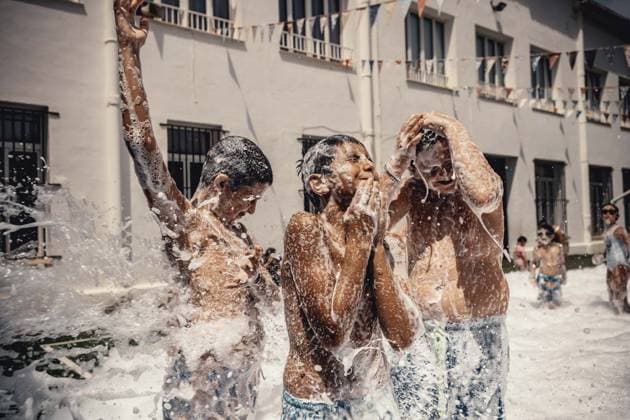 July 20, 2026, Es Mercadal, Menorca Balearic Islands, Spain: Children get covered in foam as they participate in a foam party looking for some refreshment during the traditional Sant Marti Festival in Es Mercadal Es Mercadal Spain  - ZUMAo105 20260720_fap_o105_029 Copyright: xMatthiasxOesterlex