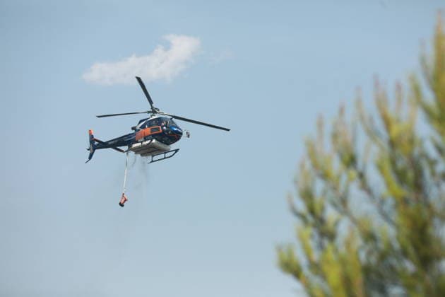 Firefighting helicopters battle wildfire in southern France TARADEAU, FRANCE - JULY 20: Firefighting helicopters drop water on a wildfire near Taradeau in the Var department of southern France on July 20, 2026. Two wildfires broke out in France s southern Var department on Sunday, burning around 90 hectares (222 acres) and forcing evacuations, local authorities said. A rapidly spreading blaze first burned around 30 hectares in Taradeau before spreading to the neighboring commune of Les Arcs, where another 60 hectares were scorched, the Var Prefecture said on the US social media company X. The prefecture said strong winds and drought-stricken vegetation were fueling the rapid spread of the fire. Authorities evacuated several hamlets, while t  Copyright: x2026xAnadoluxMohamadxSalaheldinxAbdelghanixAlsayedx