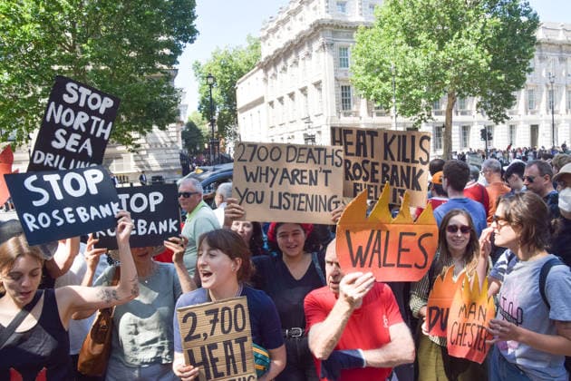 Protesters outside Downing St as Andy Burnham arrives to take over as PM, London, UK Climate activists from the group Fossil Free London stand with placards during a protest against Rosebank and other oil and gas projects in the North Sea outside Downing Street ahead of the arrival of Andy Burnham, who starts his first day as the new UK Prime Minister replacing Keir Starmer. London United Kingdom Copyright: xVukxValcicx xSOPAxImagesx VukValcicBurnhamProtestsDowning200726_38