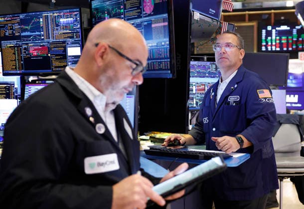 Traders work on the floor of the New York Stock Exchange on Wall Street on Monday, July 20, 2026 in New York City. The S&P 500 and Nasdaq Composite began the day higher on Monday and oil prices fluctuated in response to the latest bout of military exchanges between the U.S. and Iran.  NYP20260720105 JOHNxANGELILLO