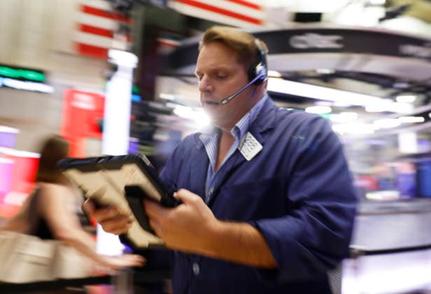 Traders work on the floor of the New York Stock Exchange on Wall Street on Monday, July 20, 2026 in New York City. The S&P 500 and Nasdaq Composite began the day higher on Monday and oil prices fluctuated in response to the latest bout of military exchanges between the U.S. and Iran.  NYP20260720108 JOHNxANGELILLO