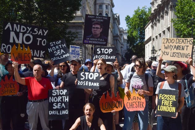 July 20, 2026, London, United Kingdom: Climate activists from the group Fossil Free London stand with placards during a protest against Rosebank and other oil and gas projects in the North Sea outside Downing Street ahead of the arrival of Andy Burnham, who starts his first day as the new UK Prime Minister replacing Keir Starmer. London United Kingdom  - ZUMAs197 20260720_aaa_s197_105 Copyright: xVukxValcicx