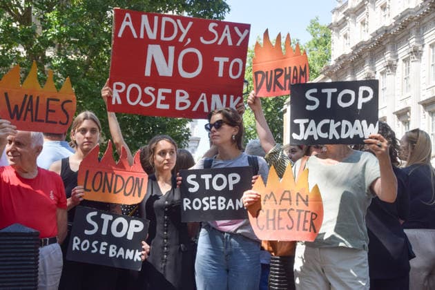 July 20, 2026, London, United Kingdom: Climate activists from the group Fossil Free London stand with placards during a protest against Rosebank and other oil and gas projects in the North Sea outside Downing Street ahead of the arrival of Andy Burnham, who starts his first day as the new UK Prime Minister replacing Keir Starmer. London United Kingdom - ZUMAs197 20260720_aaa_s197_113 Copyright: xVukxValcicx