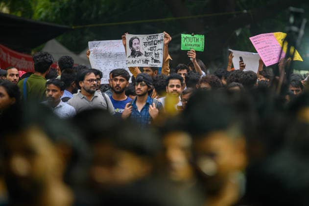 July 20, 2026, New Delhi, New Delhi, India: NEW DELHI, India Ã¢â‚¬ Protesters hold placards, including one reading Youth Revolution Day, 20 July, as they march at Jantar Mantar during demonstrations by the Cockroach Janata Party (CJP) demanding the resignation of Education Minister Dharmendra Pradhan over alleged irregularities in the NEET-UG exam, July 20, 2026. New Delhi India - ZUMAm184 20260720_zip_m184_007 Copyright: xAnkitxRoyxMajumderx
