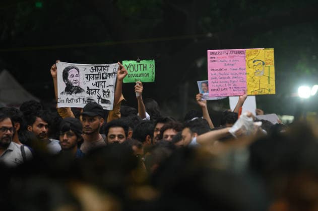 July 20, 2026, New Delhi, New Delhi, India: NEW DELHI, India Ã¢â‚¬ Protesters hold placards, including one styled as a mock degree certificate awarding Prime Minister Narendra Modi a Master of Jumlebazi and listing alleged government failures, at Jantar Mantar during demonstrations by the Cockroach Janata Party (CJP) demanding the resignation of Education Minister Dharmendra Pradhan over alleged irregularities in the NEET-UG exam, July 20, 2026. New Delhi India  - ZUMAm184 20260720_zip_m184_009 Copyright: xAnkitxRoyxMajumderx