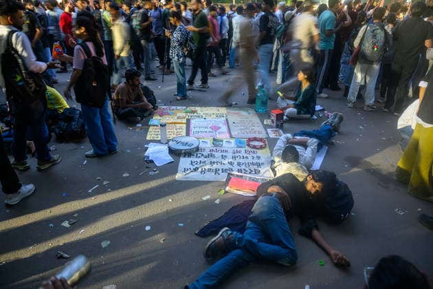 July 20, 2026, New Delhi, New Delhi, India: NEW DELHI, India Ã¢â‚¬ Protesters sleep on the ground amid placards and belongings at Jantar Mantar in the early hours during demonstrations by the Cockroach Janata Party (CJP) demanding the resignation of Education Minister Dharmendra Pradhan over alleged irregularities in the NEET-UG exam, July 20, 2026. New Delhi India - ZUMAm184 20260720_zip_m184_008 Copyright: xAnkitxRoyxMajumderx