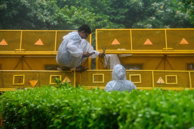 July 20, 2026, New Delhi, New Delhi, India: NEW DELHI, India Ã¢â‚¬ A worker deputed by Delhi Police welds security barricades together to reinforce them against protesters, near Jantar Mantar during demonstrations by the Cockroach Janata Party (CJP) demanding the resignation of Education Minister Dharmendra Pradhan over alleged irregularities in the NEET-UG exam, July 20, 2026. New Delhi India - ZUMAm184 20260720_zip_m184_025 Copyright: xAnkitxRoyxMajumderx
