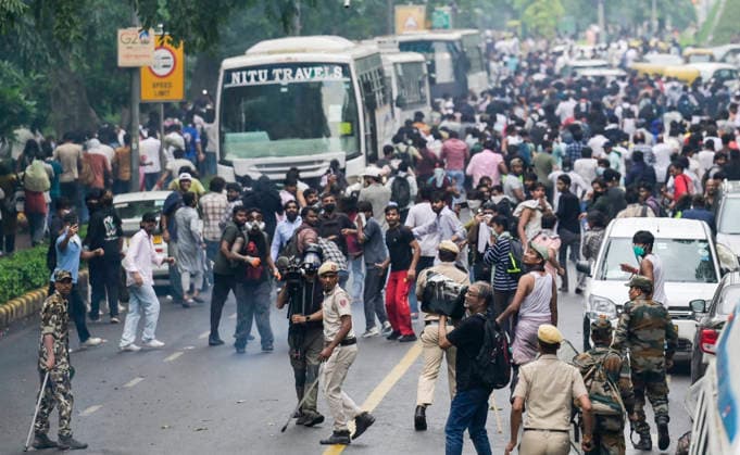 NEW DELHI, INDIA - JULY 20: Security personnel carry out Lathi charge during CJP protest March to near the Parliament on July 20, 2026 in New Delhi, India. (Photo by Raj K Raj Hindustan Times) Delhi Police And Protestors Injured In Clash During Protest March