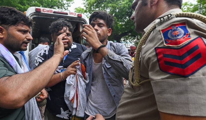 NEW DELHI, INDIA - JULY 20: An injured Cockroach Janata Party (CJP) supporter during a protest march, at Sansad Marg on July 20, 2026 in New Delhi, India. (Photo by Raj K Raj Hindustan Times) Delhi Police And Protestors Injured In Clash During Protest March