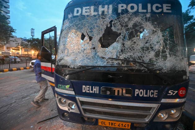 NEW DELHI, INDIA - JULY 20: A view of a police vehicle damaged during clashes involving CJP protesters on Janpath on July 20, 2026 in New Delhi, India. Protesters marching toward Parliament defied prohibitory orders under Section 163, leading to severe altercations with police. The clash resulted in nearly 50 police personnel injured and over 70 detentions. Delhi Police buses and SUVs were smashed. The march was organized to demand accountability for exam paper irregularities and the resignation of Education Minister Dharmendra Pradhan.(Photo by Raj K Raj Hindustan Times) Delhi Police Vehicles Damaged Following CJP Protest March