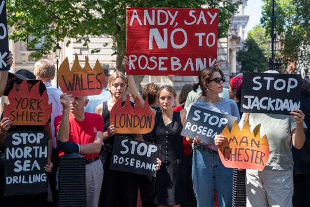 July 20, 2026, London, England, United Kingdom: Supporters of the Fossil Free London staged a demonstration outside Downing Street to demand from the new Prime Minister of the United Kingdom, Andy Burnham to say no for the Rosebank oilfield drilling on the North Sea. .The Rosebank oil field is the UKÃ¢â‚¬â ¢s largest untapped oil reserve, located roughly 130 km west of Shetland. Operated by Adura (a joint venture between Equinor and Shell) and co-owned by Ithaca Energy. London United Kingdom - ZUMAe120 20260720_zip_e120_013 Copyright: xKrisztianxElekx