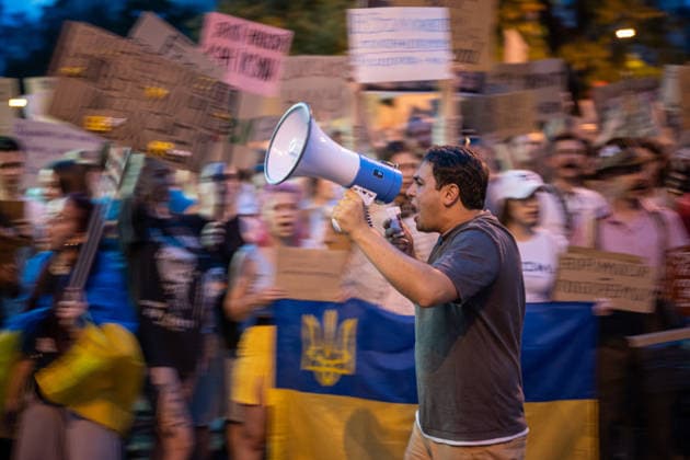 Ukrainians protest against the dismissal of Defense Minister Fedorov in Kyiv KYIV, UKRAINE - JULY 20: People attend a rally to protest the dismissal of defense minister of Ukraine Mykhailo Fedorov after being at post for 6 months in Kyiv, Ukraine, on July 20, 2026. Protesters also demand the dismissal of Commander-in-Chief of the Afrmed Forces of Ukraine Oleksandr Syrskyi and the reform of the Ukrainian army. Danylo Antoniuk Anadolu Kyiv Ukraine. Editorial use only. Please get in touch for any other usage.  Copyright: x2026xAnadoluxDanyloxAntoniukx